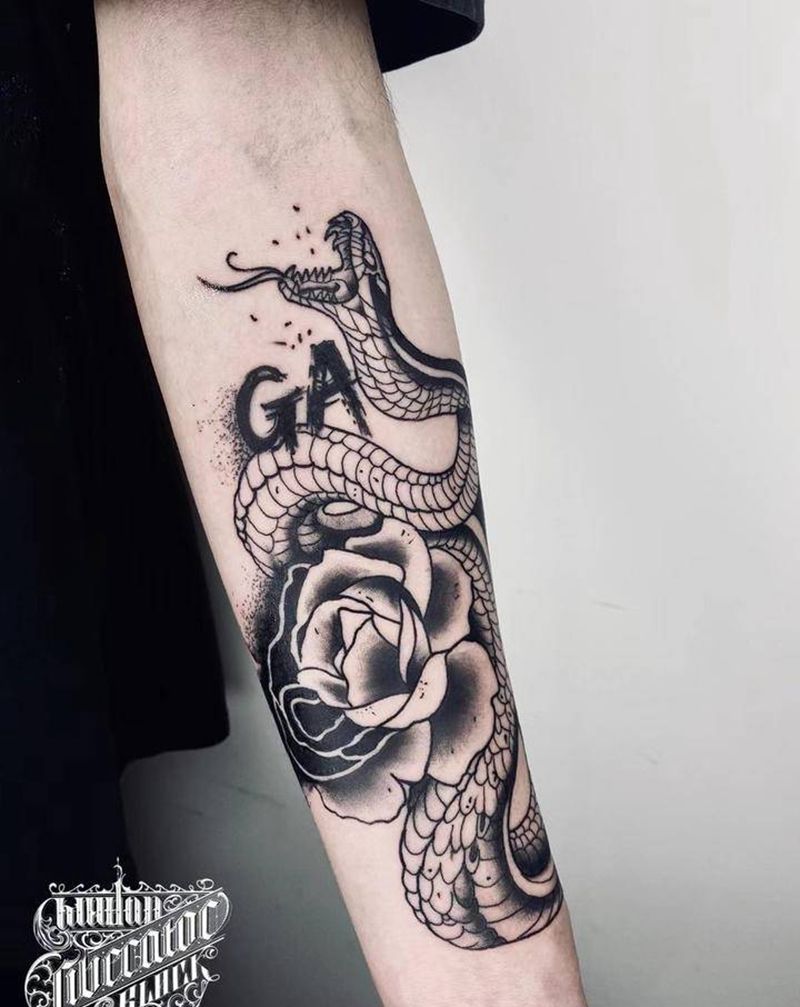 蛇与蔷薇纹身图片_手臂蛇蔷薇喷溅纹身图案
