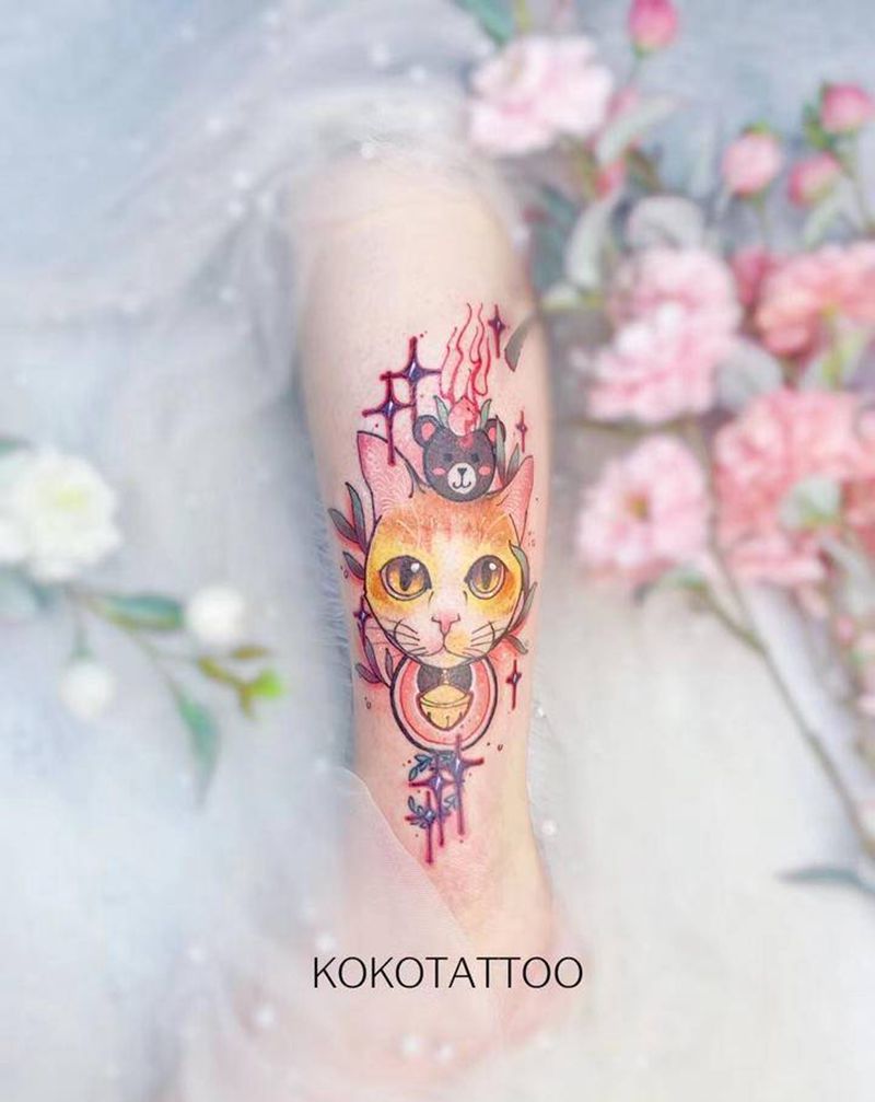 菊猫—遮盖纹身图片_腿部点刺新传统猫遮盖定制设计纹身图案