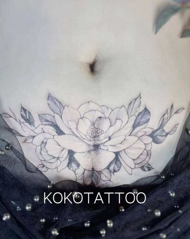 素花—遮盖纹身图片_腹部点刺素花刨妇产遮盖纹身图案