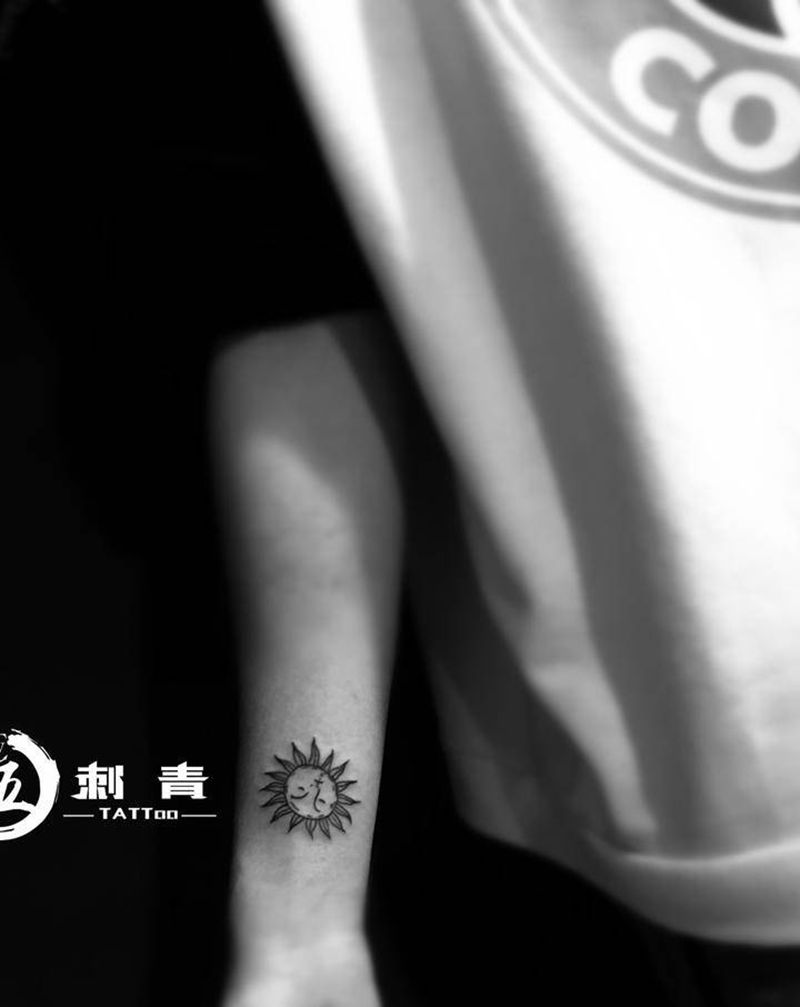 小太阳纹身图片_手臂纹身图案