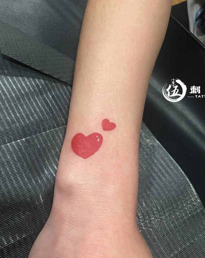 爱心遮盖纹身图片_手臂纹身图案