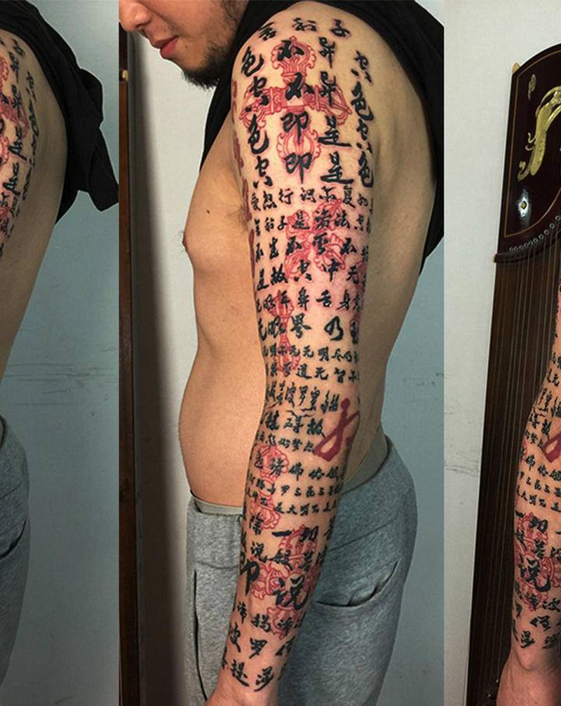 金刚经纹身图片_手臂水墨汉字金刚经金刚杵纹身图案