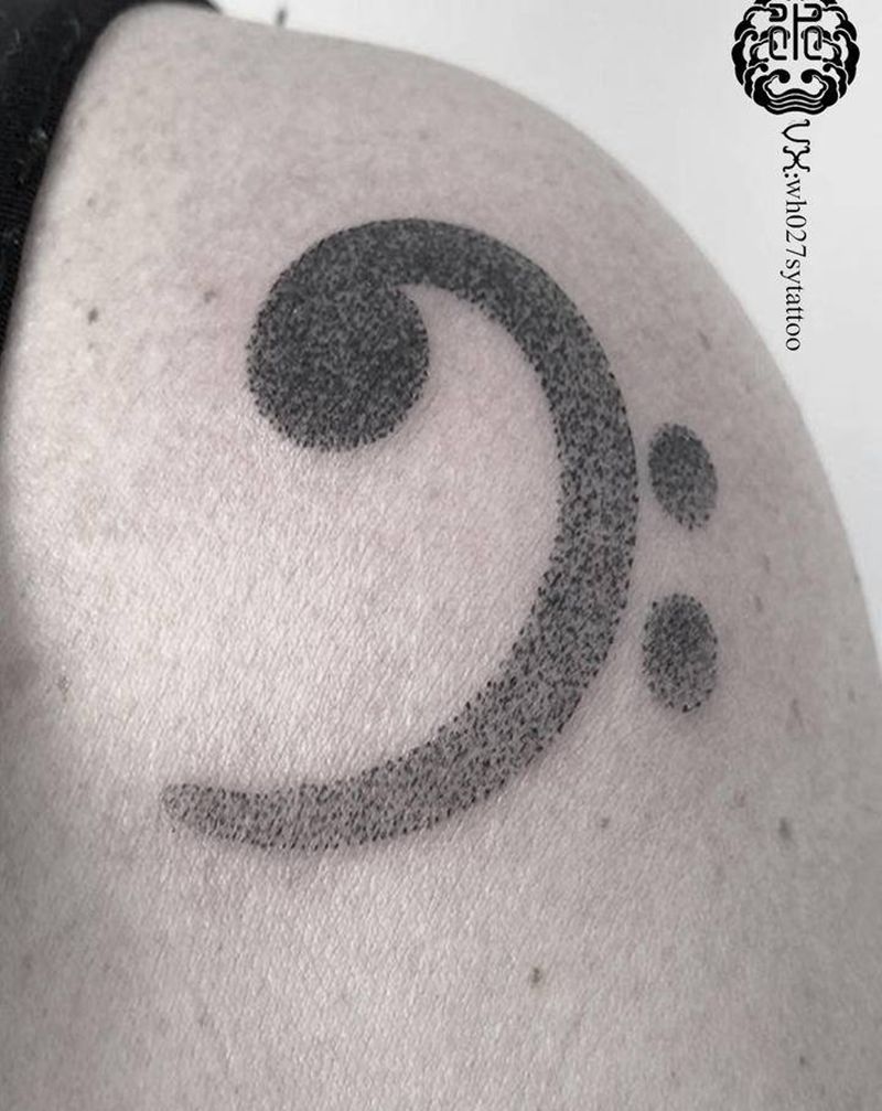 低音谱号纹身图片_手臂点刺低音谱号音乐纹身图案