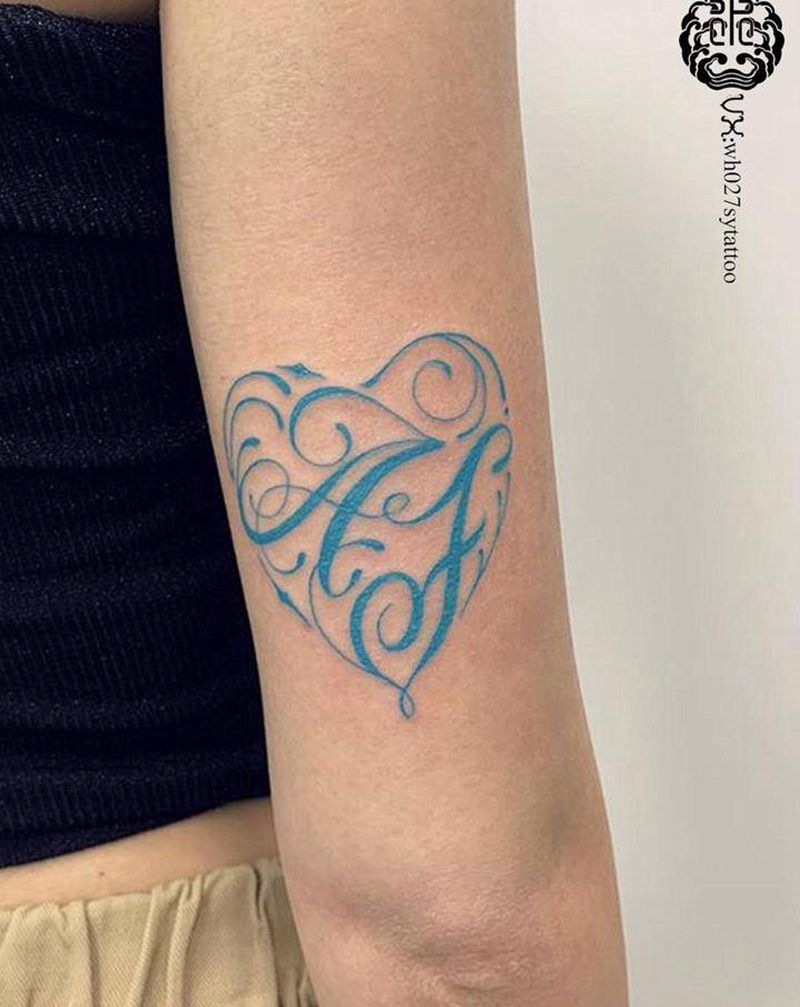 花体字纹身图片_手臂花体字纹身图案