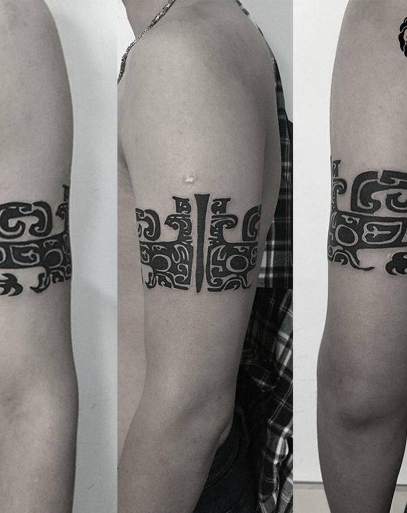 饕餮纹身图片_手臂图腾饕餮饕餮纹纹身图案