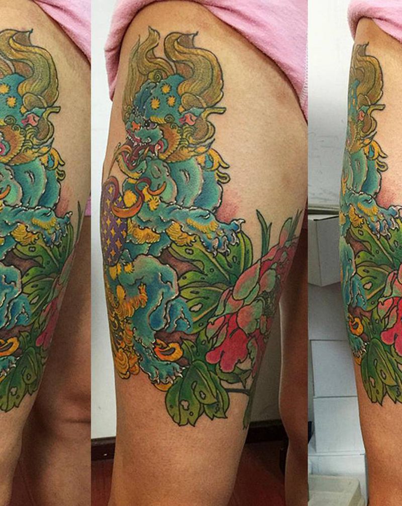 唐狮子（烫伤遮盖）纹身图片_腿部新传统唐狮子唐狮牡丹纹身图案