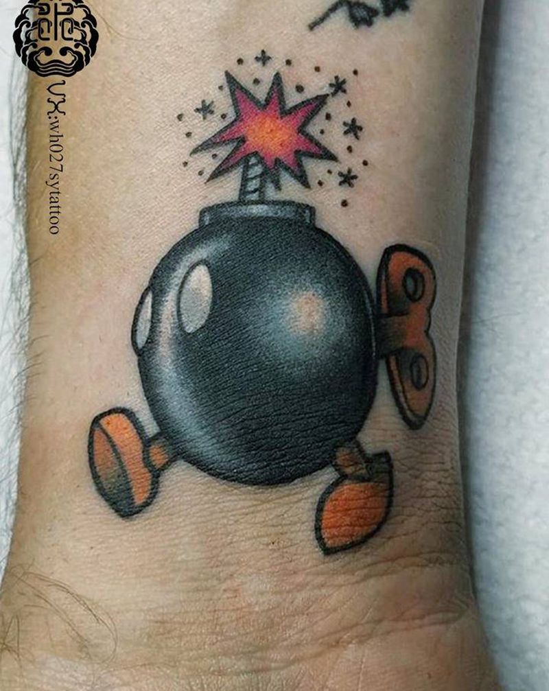 发条地雷纹身图片_手臂New School地雷发条玩具纹身图案