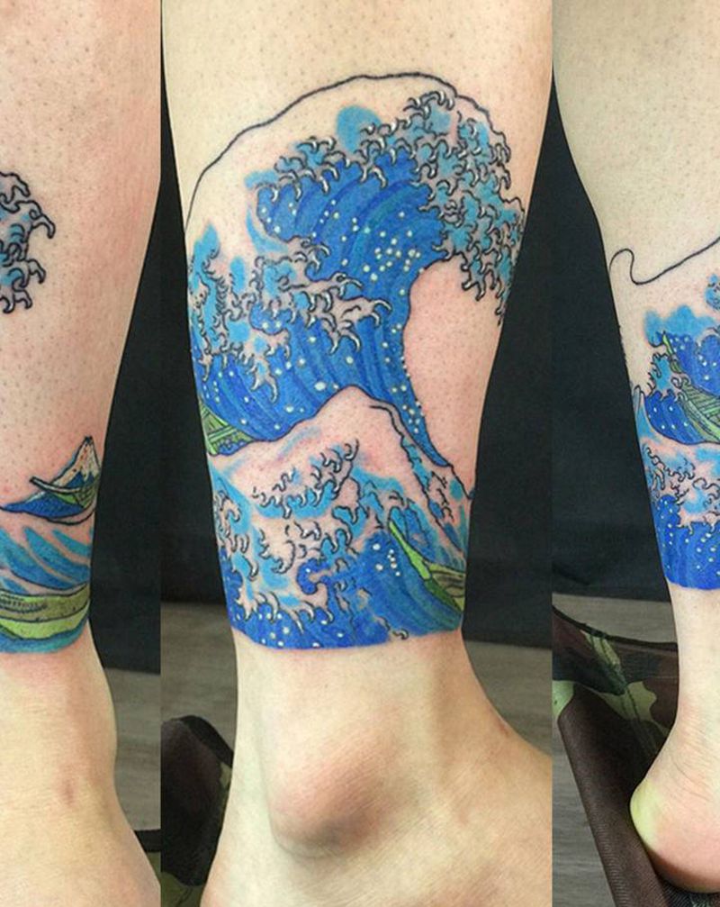 神奈川冲浪里纹身图片_腿部新传统海浪神奈川水浪纹身图案