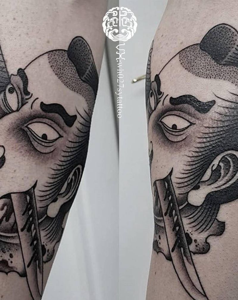 生首纹身图片_腿部老传统纹身图案