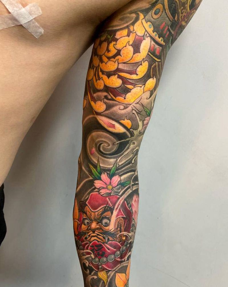 旧纹身接花臂纹身图片_手臂手部新传统达摩菊花 漩涡纹身图案