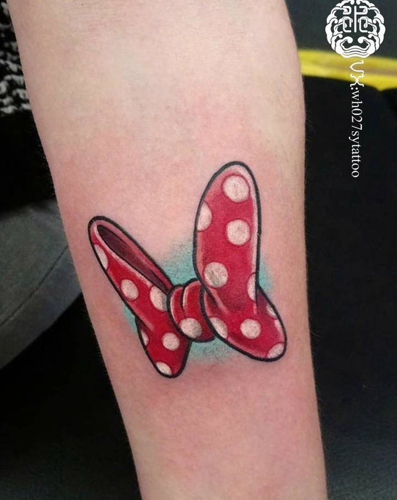 蝴蝶结纹身图片_手臂New School蝴蝶结纹身图案