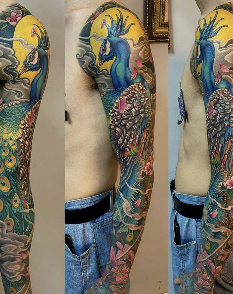 孔雀花臂纹身图片_手臂手部新传统欧美写实孔雀樱花花臂纹身图案