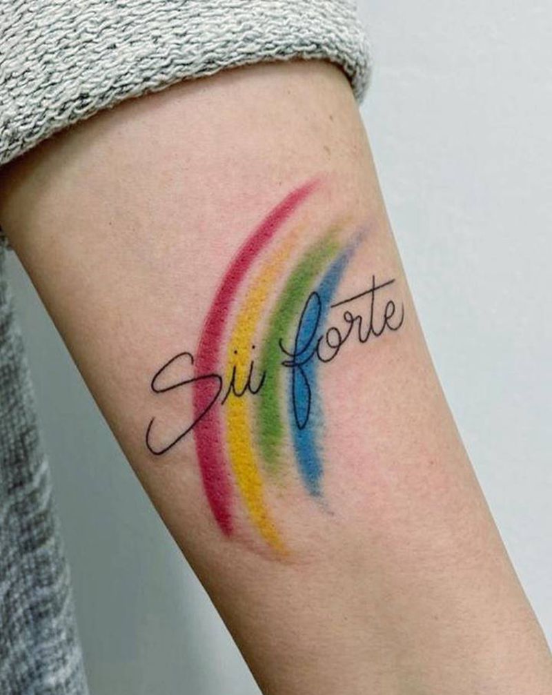彩虹纹身图片_手臂水彩彩虹纹身图案
