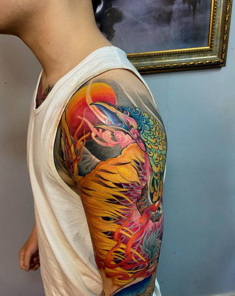 烈火凤凰纹身图片_手臂手部新传统老传统凤凰花臂纹身图案