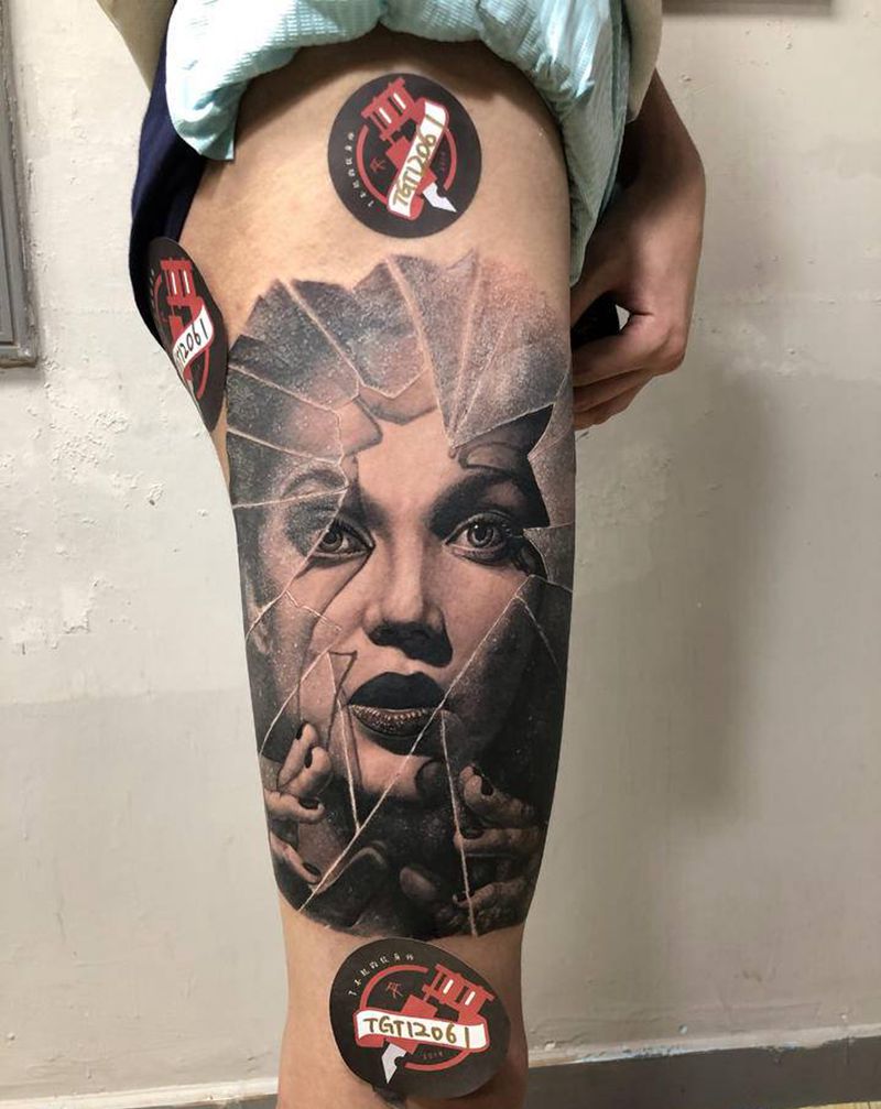 碎玻璃美女纹身图片_腿部欧美写实纹身图案