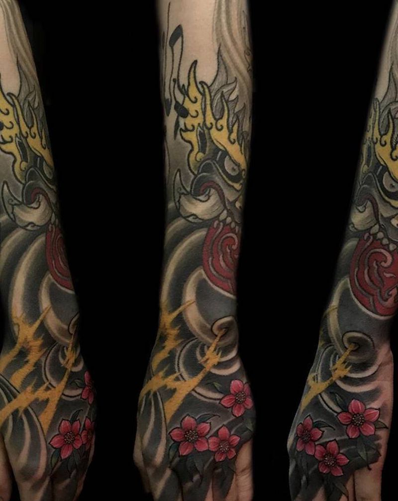 传统唐狮包小臂纹身图片_手臂新传统纹身图案