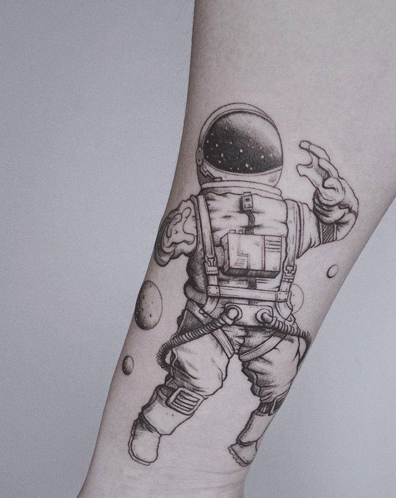宇航员纹身图片_手臂纹身图案