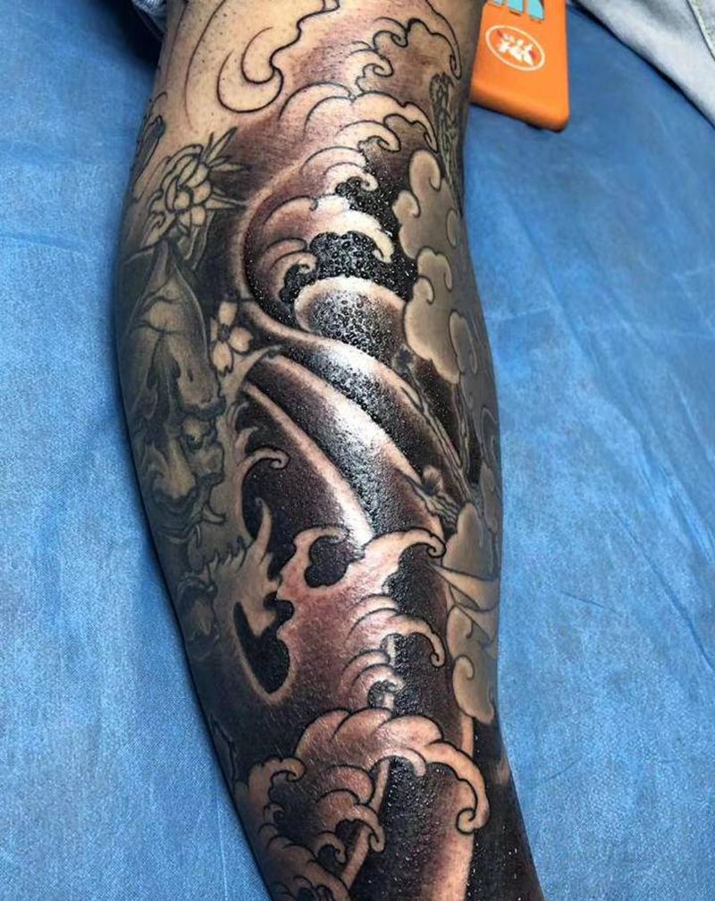 浪衔接纹身图片_腿部新传统纹身图案