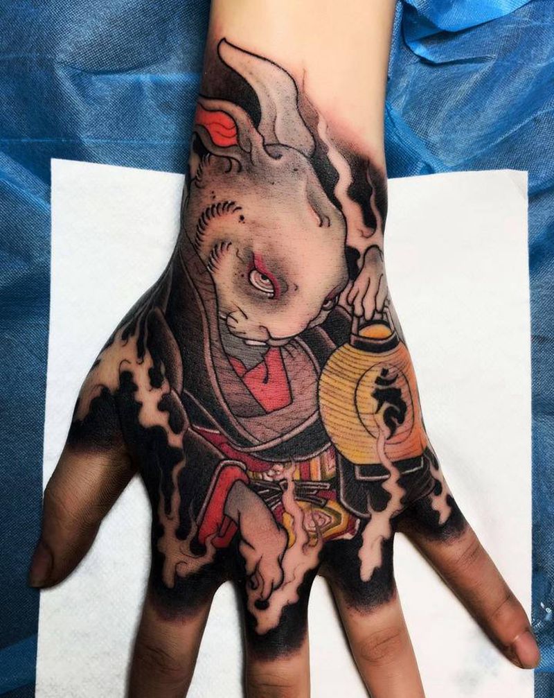 兔子 未完纹身图片_手部新传统纹身图案