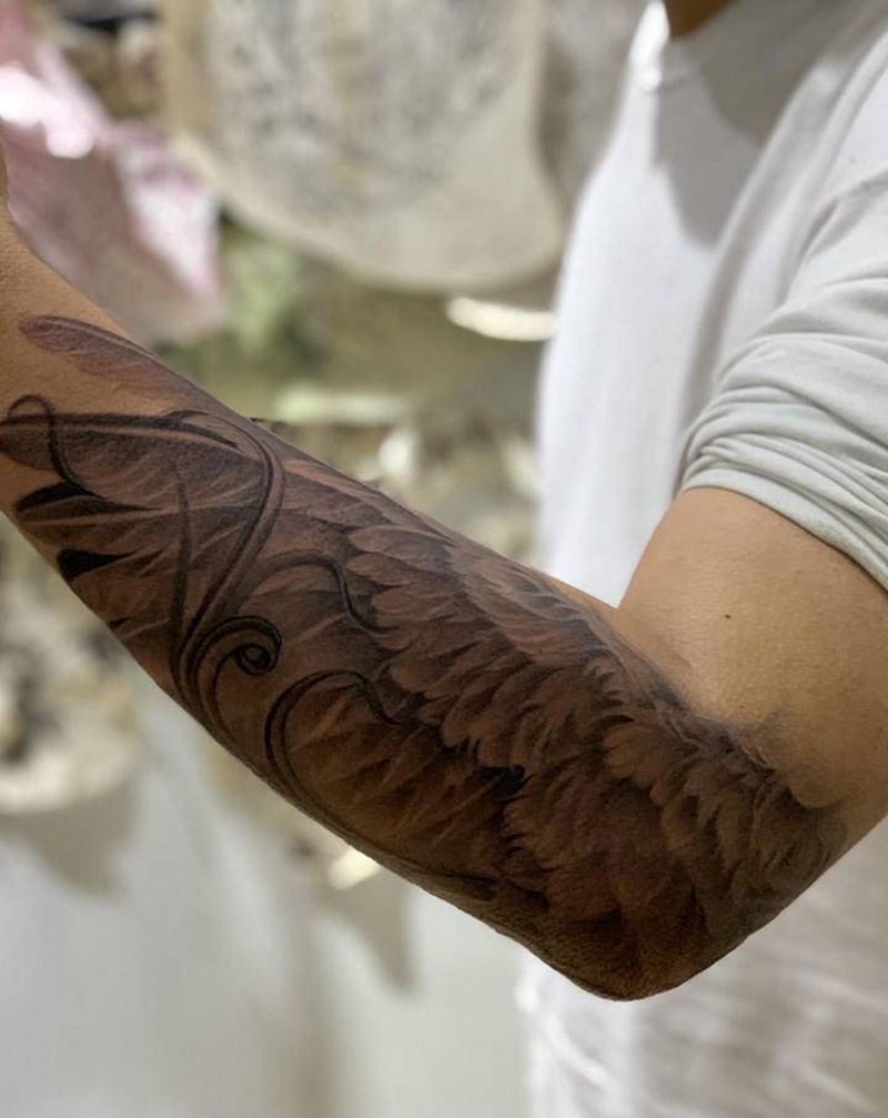 今日作品更新#小臂翅膀#纹身图片_手臂欧美写实翅膀纹身图案