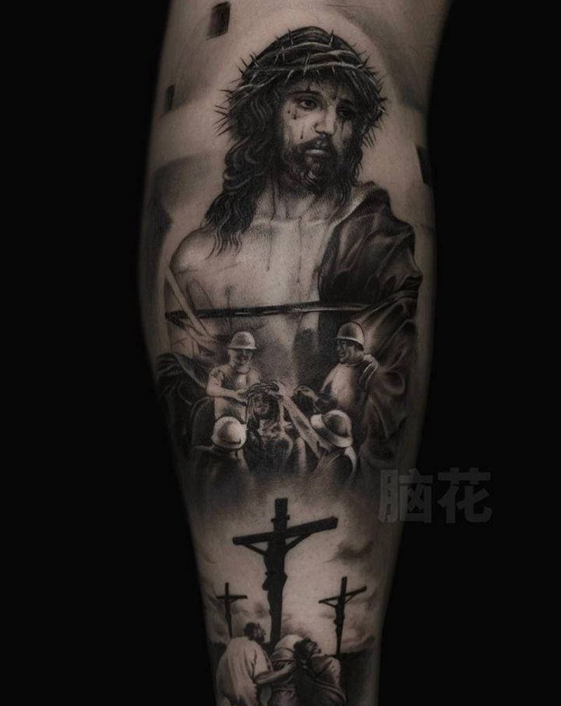耶稣纹身图片_腿部欧美写实纹身图案