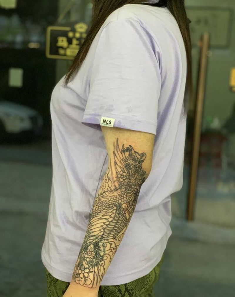 今日作品更新（线条完美完成）纹身图片_手臂新传统凤凰纹身图案