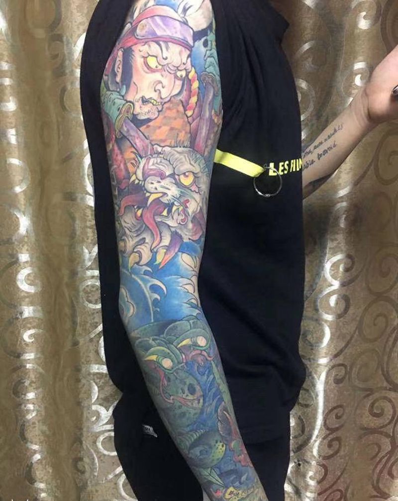 遮盖花臂纹身图片_手臂新传统New School纹身图案