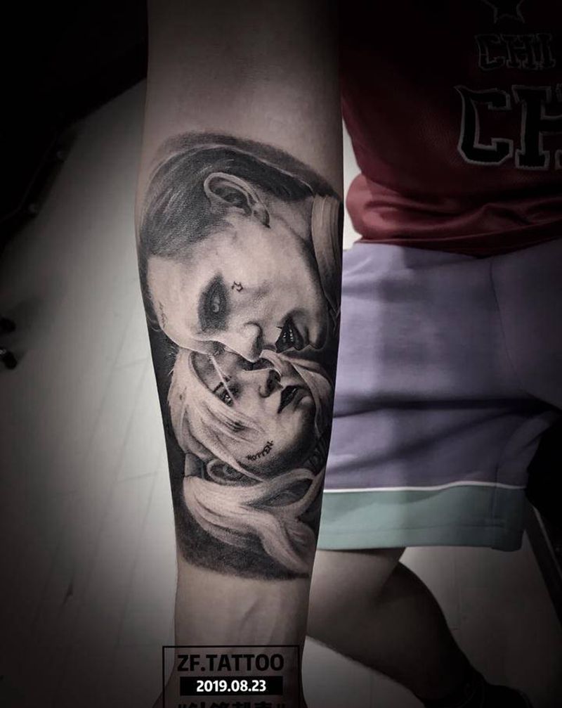 小丑男与小丑女纹身图片_手臂欧美写实纹身图案