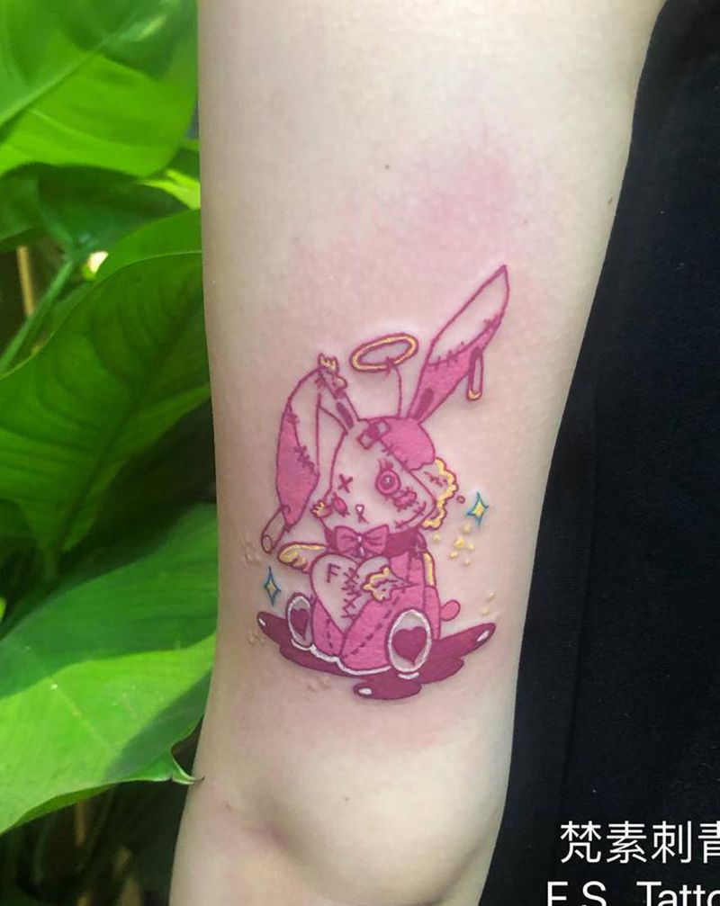 布偶兔纹身图片_手臂纹身图案