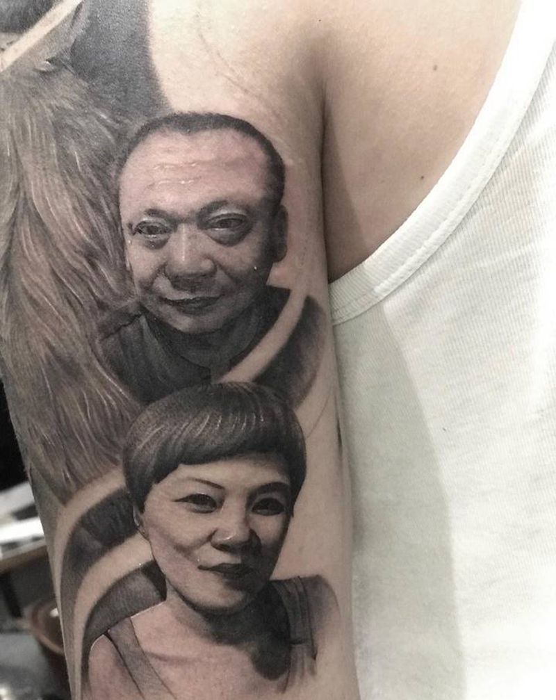 父母纹身图片_手臂欧美写实纹身图案