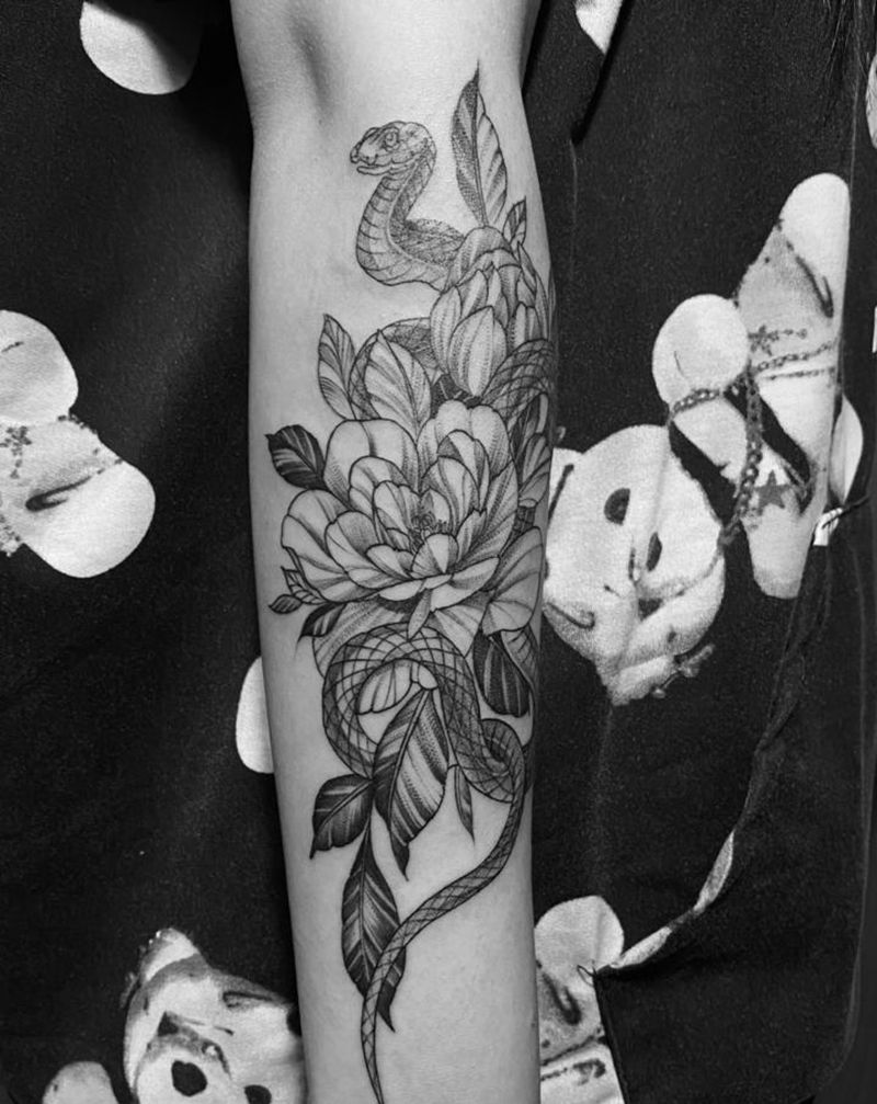 素花 线条的 蛇纹身图片_手臂纹身图案