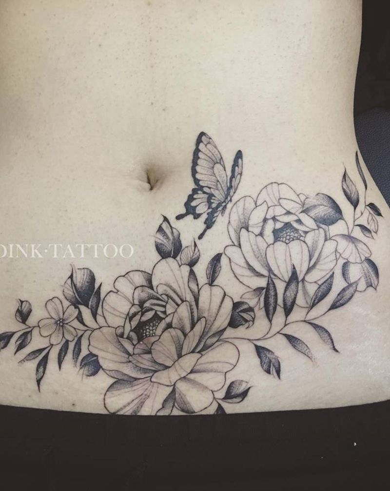 素花纹身图片_腹部点刺素花植物花儿纹身图案