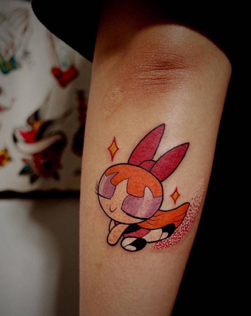 飞天小女警纹身图片_手臂老传统Old School动漫纹身图案