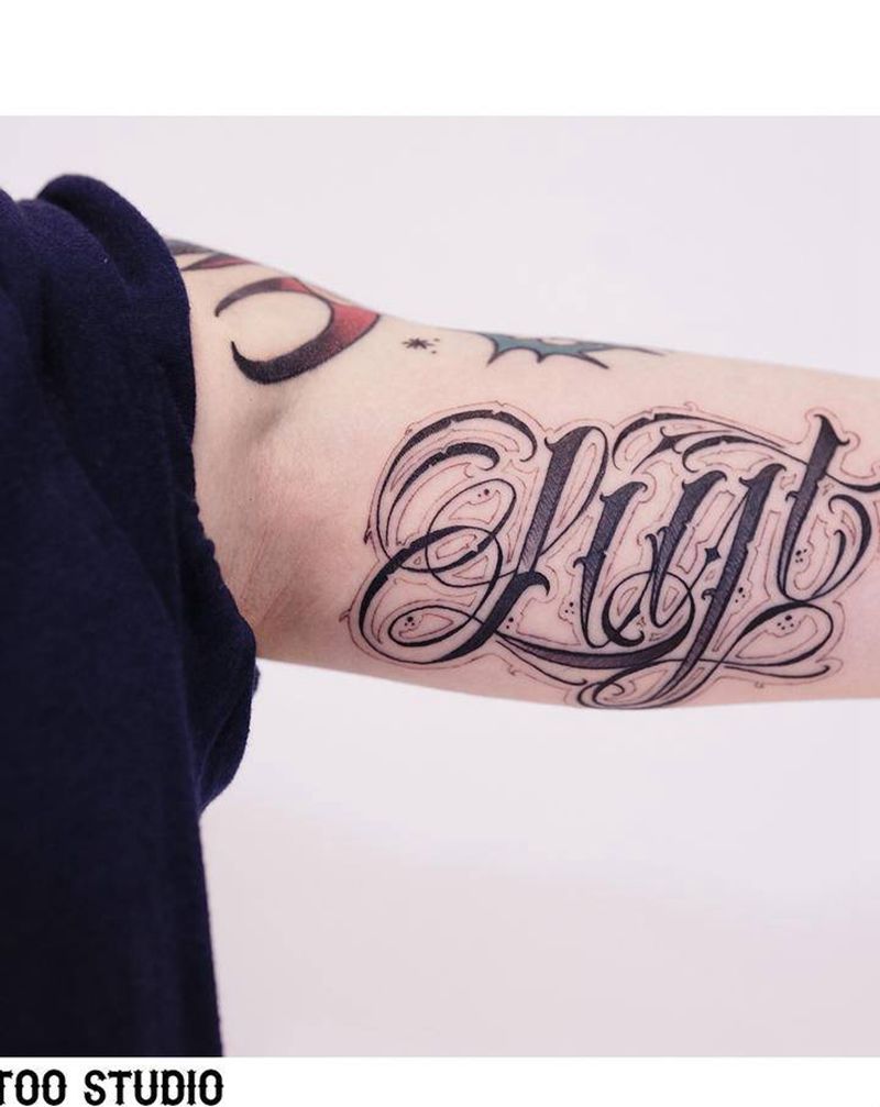 花体字纹身图片_手臂花体字单词名字纹身图案