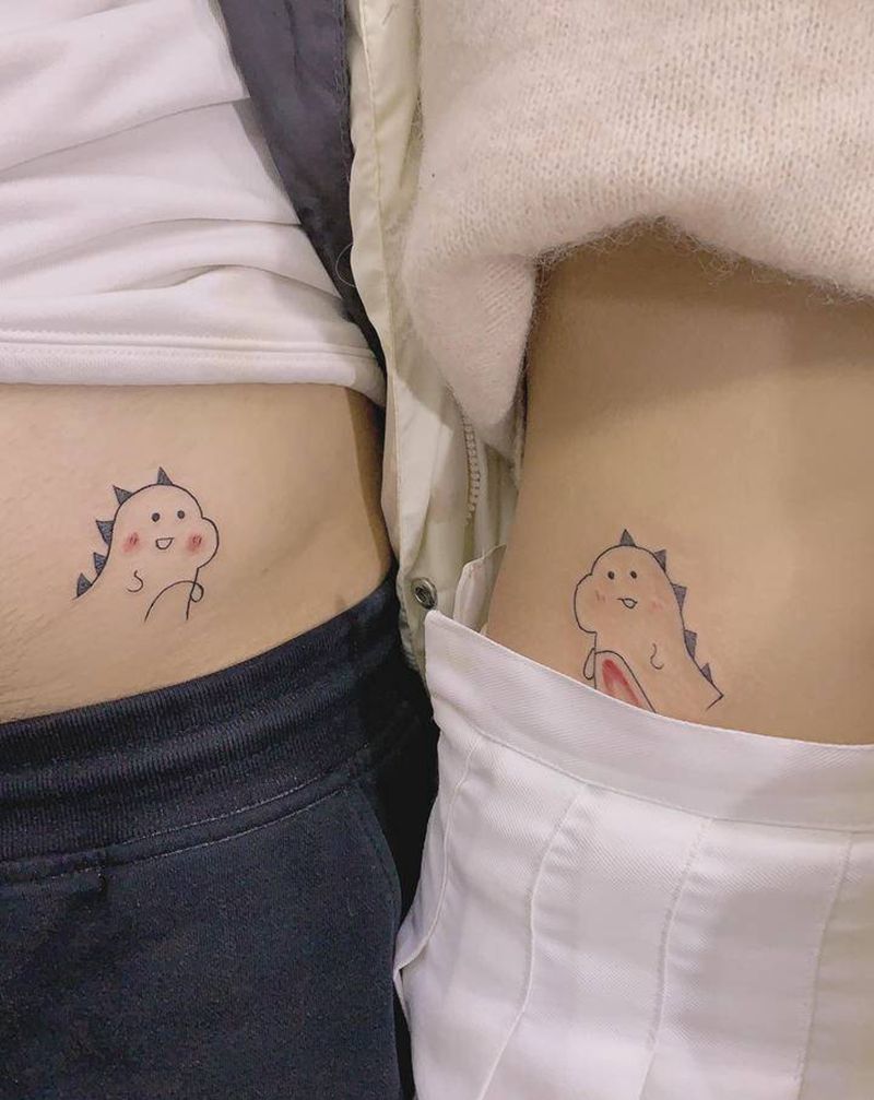 小恐龙纹身图片_腹部新传统纹身图案