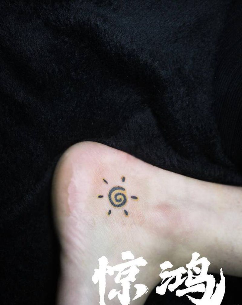 小太阳纹身图片_脚部纹身图案