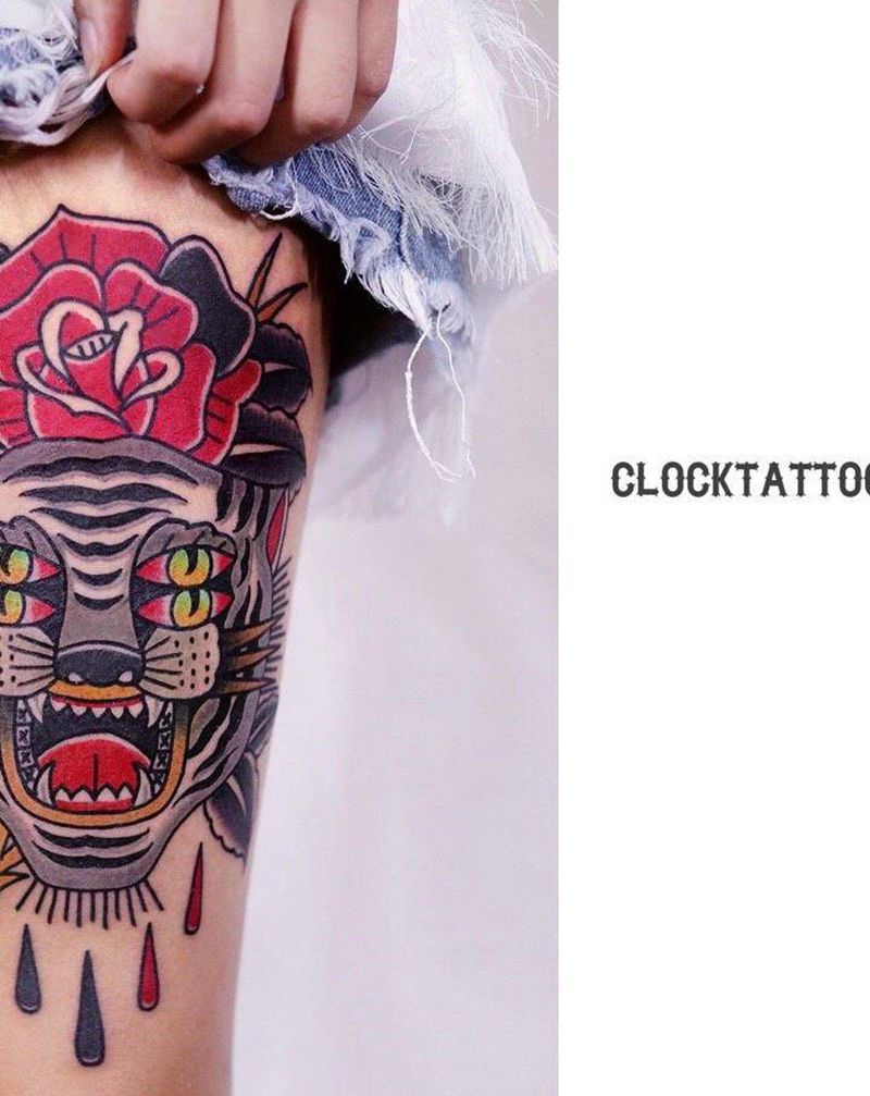 目眩虎和玫瑰纹身图片_臀部腿部老传统Old School老虎玫瑰纹身图案