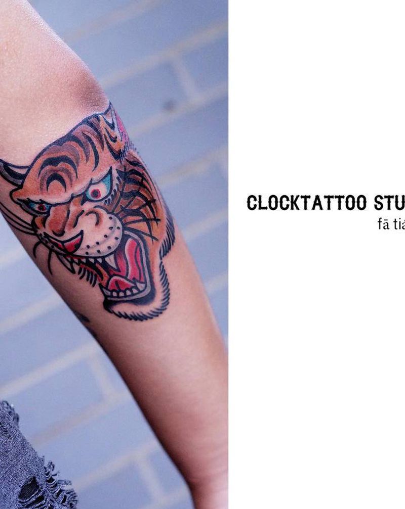 虎首纹身图片_手臂老传统Old School老虎纹身图案