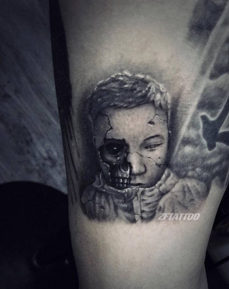 石雕肖像纹身图片_手臂欧美写实石雕纹身图案