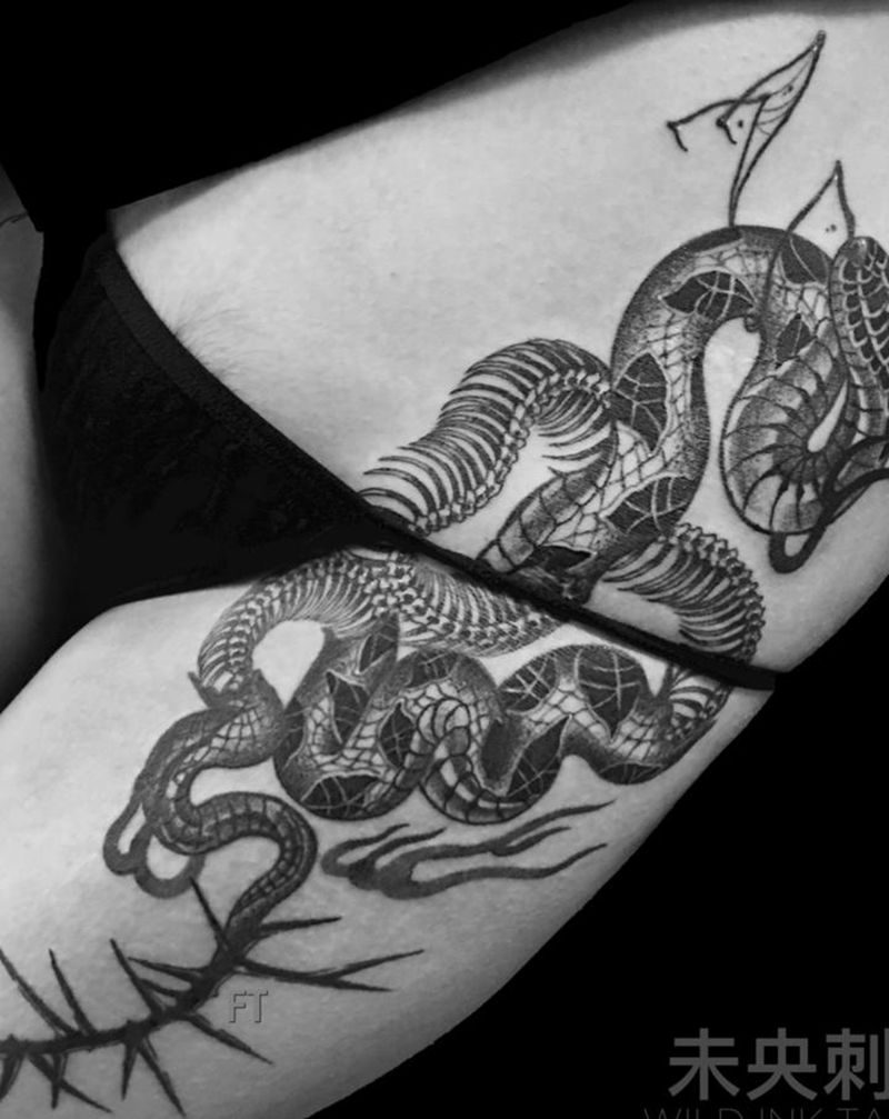 骨蛇纹身图片_腿部点刺蛇纹身图案