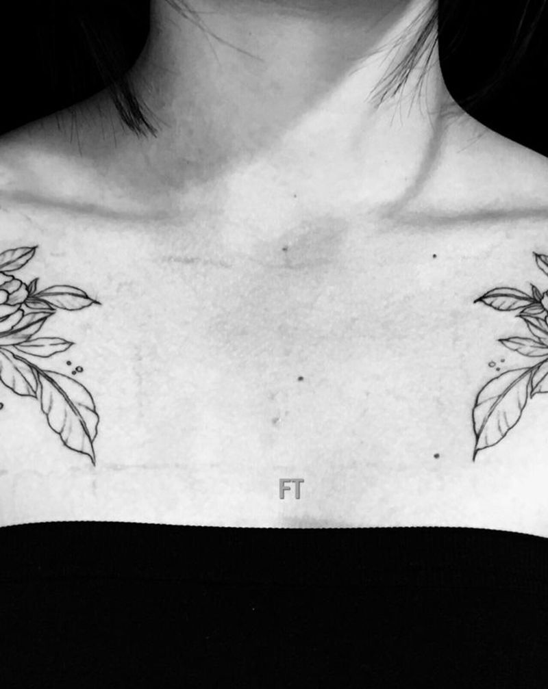 素花未完纹身图片_肩部点刺素花纹身图案