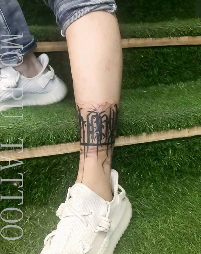 花体字纹身图片_腿部纹身图案