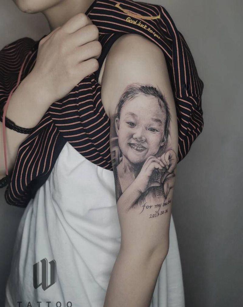 宝贝女儿纹身图片_手臂欧美写实纹身图案