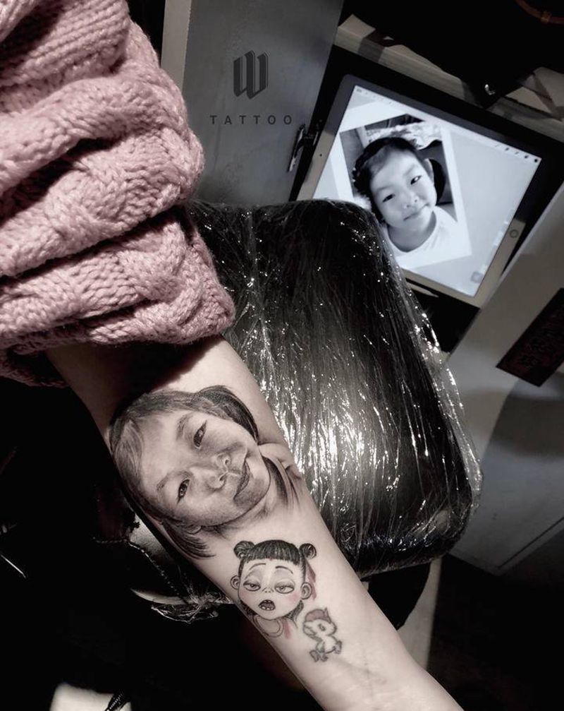 千金宝贝纹身图片_手臂欧美写实纹身图案