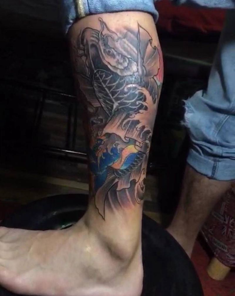 作品鱼纹身图片_腿部纹身图案