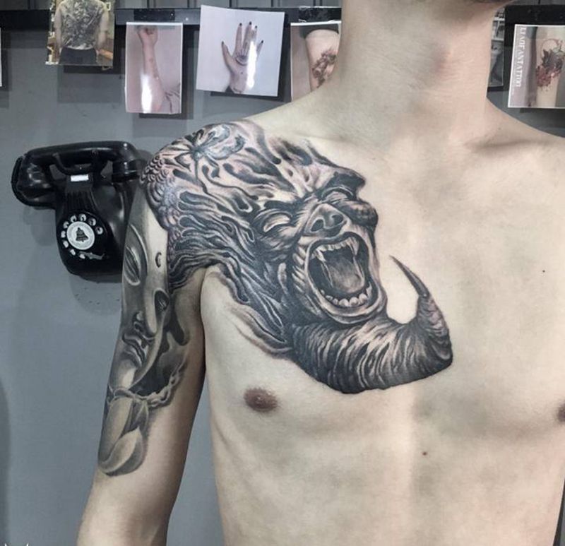 佛与魔纹身图片_手臂胸部欧美写实老传统佛魔彼岸花纹身图案