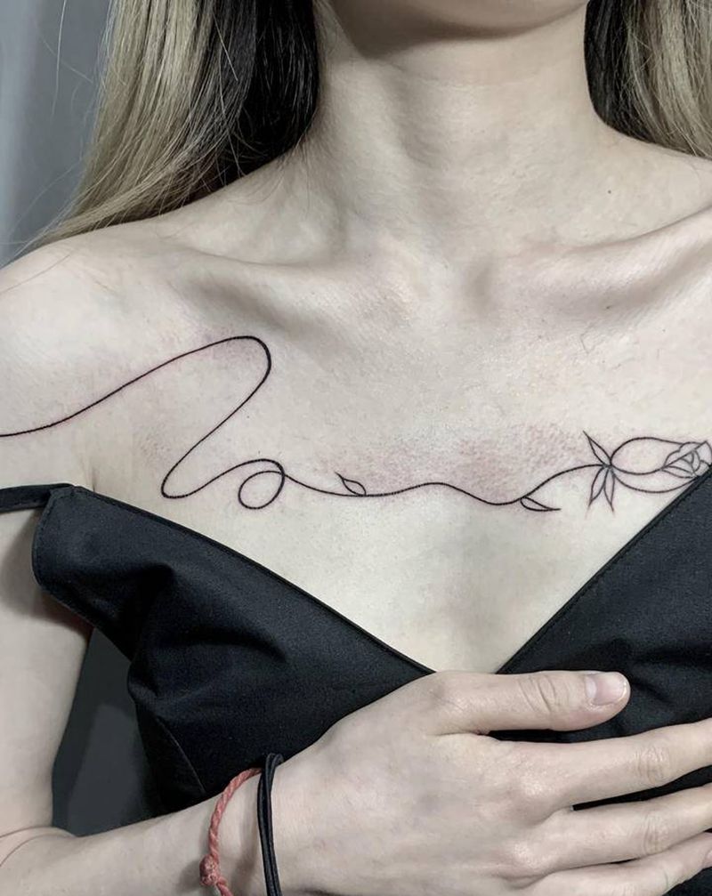 线纹身图片_胸部几何纹身图案