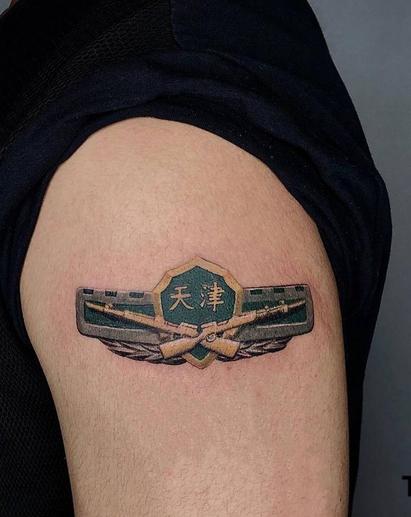 徽章纹身图片_手臂欧美写实纹身图案
