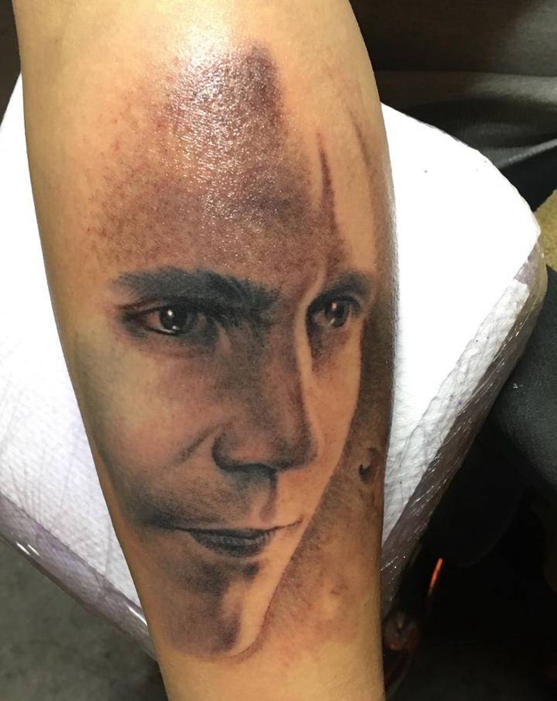 未完纹身图片_手臂欧美写实纹身图案