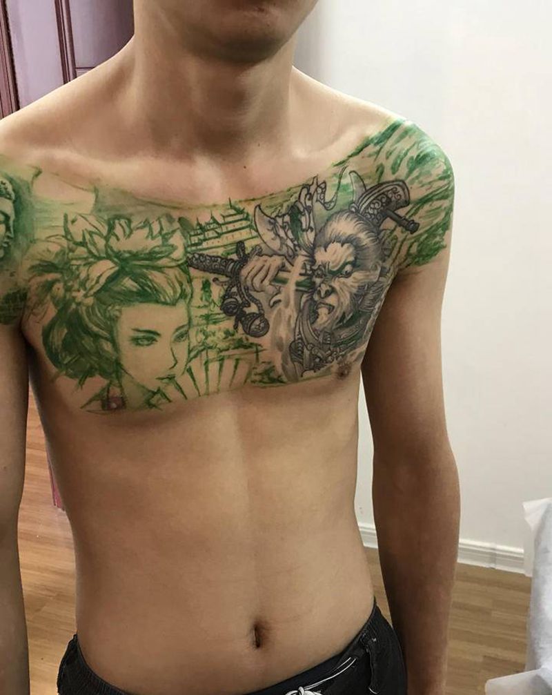 花胸未完成纹身图片_胸部纹身图案